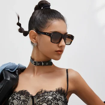 Model wearing oversize polarised sunglasses with UV400 protection