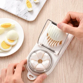 Plastic and stainless steel 2-in-1 egg slicer and divider for kitchen use