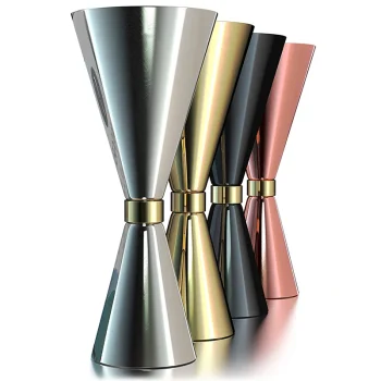 Assorted stainless steel cocktail jiggers for precise drink measurement in different sizes and finishes